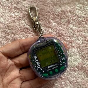 1997 Microchimp Purple Giga Pets Digital Keychain